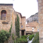 Imagen de uno de los rincones de Orbaneja junto al molino.-ECB