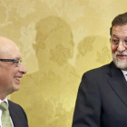Cristóbal Montoro y Mariano Rajoy.-ARCHIVO / EFE