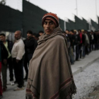Refugiados en el campamento de Moria, en Grecia.-REUTERS