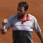 Wawrinka celebra un punto ante Tsonga.-Foto: AFP / MIGUEL MEDINA