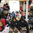 Inmigrantes y refugiados rescatados por Proactiva Open Arms la noche del 25 de diciembre.-PROACTIVA OPEN ARMS