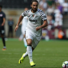 Gonzalo Higuaín, durante el partido de la Juventus de este domingo ante el West Ham.-AFP / JUSTIN TALLIS