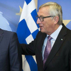 Tsipras y Jean-Claude Juncker.-Foto: AFP / JULIEN WARNARD