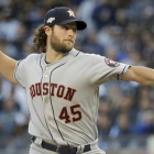 El lanzador Gerrit Cole establece un nuevo récord al fichar por los Yankees de NY. El lanzador Gerrit Cole establece un nuevo récord al fichar por los Yankees de NY.-AP