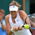Muguruza, en un momento de su partido ante Lucic.-Foto: AFP / GLYN KIRK