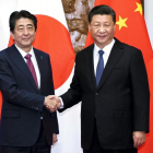 Xi Jinping, presidente de China, y Shinzo Abe, primer ministro de Japón.-AP / LI TAO XINHUA