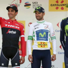 Marc Soler, a la derecha, junto a Valverde y Contador, en el podio de la Volta.-EFE / TONI ALBIR