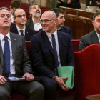 Joaquim Forn, Raül Romeva y Oriol Junqueras, en el banquillo del juicio del procés.-POOL / EMILIO NARANJO