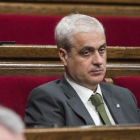 El exconseller de Justícia Germà Gordó, en su escaño del Parlament.-FERRAN SENDRA