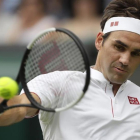 Federer en su partido ante Lacko-KIRSTY WIGGLESBOURGH