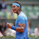 Nadal, durante el partido que ha disputado este jueves contra Almagro, en Roland Garros.-Foto:   AP / CHRISTOPHE ENA