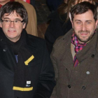 Carles Puigdemont y Toni Comín, en un acto en Lovaina el pasado 6 de febrero.-LAURA POUS (ACN)