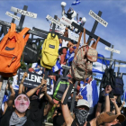 Manifestación de estudiantes contra el presidente Ortega en Managua.-/ AP / ESTEBAN FELIX