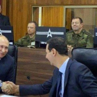 Vladímir Putin da la mano a Bashar el Asad durante su visita a Damasco.-PRESIDENCIA SIRIA