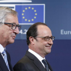El presidente de la Comisión Europea, Jean-Claude Juncker, y el presidente francés, François Hollande.-EFE / JULIEN WARNAND