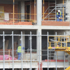 Imagen de trabajadores de la construcción.-ISRAEL L. MURILLO