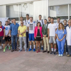 Foto de familia del San Pablo Burgos formada por jugadores, cuerpo técnico, directiva y colaboradores, ayer.-ISRAEL L. MURILLO