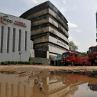 Camiones de bomberos frente al museo incendiado, este martes en Nueva Deli.-REUTERS / ANINDITO MUKHERJEE