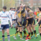Los jugadores del UBU Colina Clinic celebra un ensayo en un partido del play off.-ISRAEL L. MURILLO