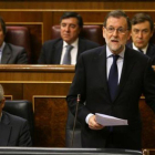 Mariano Rajoy responde a una pregunta, ayer, en el Congreso.-REUTERS / ANDREA COMAS
