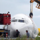 El avión de la carga de la compañía DHL accidentado.-EFE / MATTEO BAZZI