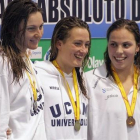 Mireia Belmonte, entre Melani Costa y María Vilas, esta pasada semana en Gijón.-EFE / ALBERTO MORANTE