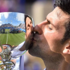 Novak Djokovic besa el trofeo del torneo de Eastbourne tras derrotar a Gaël Monfils en la final.-GLYN KIRK