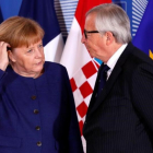 Merkel y Juncker al inicio de la cumbre informal sobre inmigración en Bruselas-REUTERS