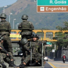 Fuerzas de seguridad vigilan los accesos a Río de Janeiro.-AFP / TASSO MARCELO