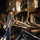 Destrozos cerca de Damasco, capital siria.-AFP / YOUSSEF KARWASHAN
