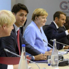 Boris Johnson, Justin Trudeau, Angela Merkel y Emmanuel Macron, durante la reunión del G-7 en Biarritz el pasado agosto.-SEAN KILPATRICK (AP)