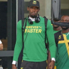 Usain Bolt, a la salida de su hotel.-AFP / ARI VERSIANI