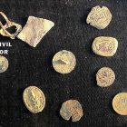 Algunos de los objetos recuperados eran monedas de la época romana.-ECB