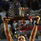 David Ferrer, con el trofeo que lo acredita como ganador del Abierto de Río.-Foto: AFP / VANDERLEI ALMEIDA