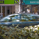 Sucursales de Caja Madrid y de Bancaja antes de fusionarse en Bankia.-MIGUEL LORENZO