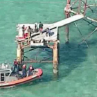 Imagen de la CBS del momento en que la Guardia Costera detuvo a los inmigrantes, en el faro American Shoal, el pasado mayo en aguas del Estrecho de Florida.-