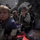 Un grupo de niños refugiados tras huir de la ciudad de Mosul.-RICARD GARCÍA VILANOVA