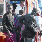 Algunos de los supervivientes de la patera, en el puerto de Almería.-EFE