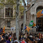 Agentes de los Mossos custodian la entrada del Palacio de Justicia de Barcelona, el pasado 20 de septiembre.-JORDI COTRINA