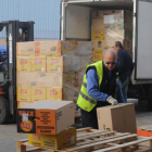 Voluntarios trabajan en la recogida en el Banco de Alimentos de Burgos.-ISRAEL L. MURILLO
