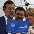 Rajoy y Aguirre, en el 2010, en un mitin contra el IVA cultural que después el PP acabó subiendo.-AGUSTÍN CATALÁN