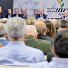 Los asistentes a la primera reunión de la asamblea general en las nuevas instalaciones de la entidad escuchan el informe del director general, Ramón Sobremonte .-ECB
