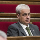 El exconseller de Justícia Germà Gordó, en su escaño del Parlament.-FERRAN SENDRA