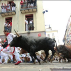 Un momento del segundo encierro, con toros de la ganadería El Tajoy y La Reina, este miércoles.-Foto: AFP / CESAR MANSO