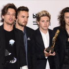 De izquierda a derecha, Louis Tomlinson, Liam Payne, Niall Horan, and Harry Styles, los miembros de One Direction, en Las Vegas, en agosto del 2015.-AFP