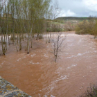 El puente de la carretera de Escuderos, testigo mudo de la crecida del Arlanza al pasar bajo sus pies.-ECB