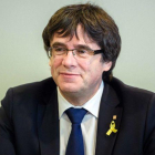 Carles Puigdemont, durante una reunión en Berlín con diputados de Junts per Catalunya.-GREGOR FISCHER (AFP)