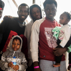 Algunas de las personas rescatadas por el Sea Watch, a bordo del barco.-SEA WATCH