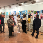 Asistentes a las exposición 'Tiempos de arte' en el momento de su inauguración en la Sala de Exposiciones del Teatro Principal