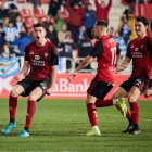 Los jugadores del Mirandés celebran un gol ante el Málaga.